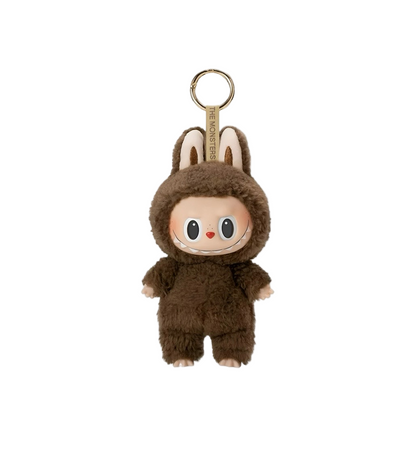Plush keychain in a brown costume on a white background