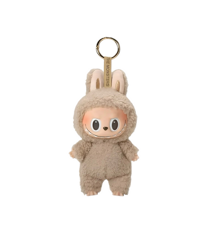 Plush keychain in a bunny costume on a white background