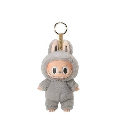 Plush keychain of a character in a gray outfit on a white background